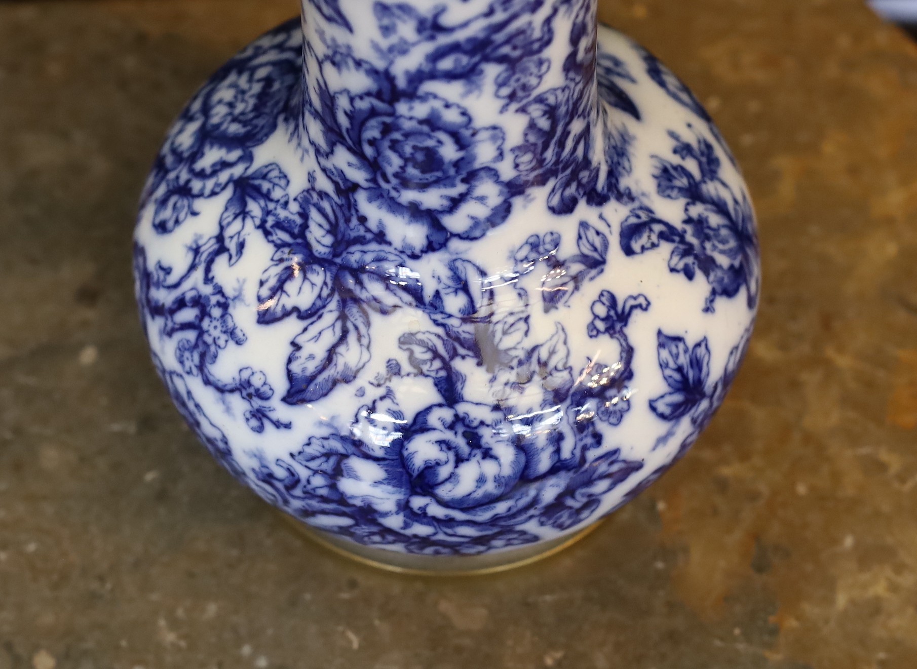 A Victorian mounted blue and white ceramic lamp base, height 38cm